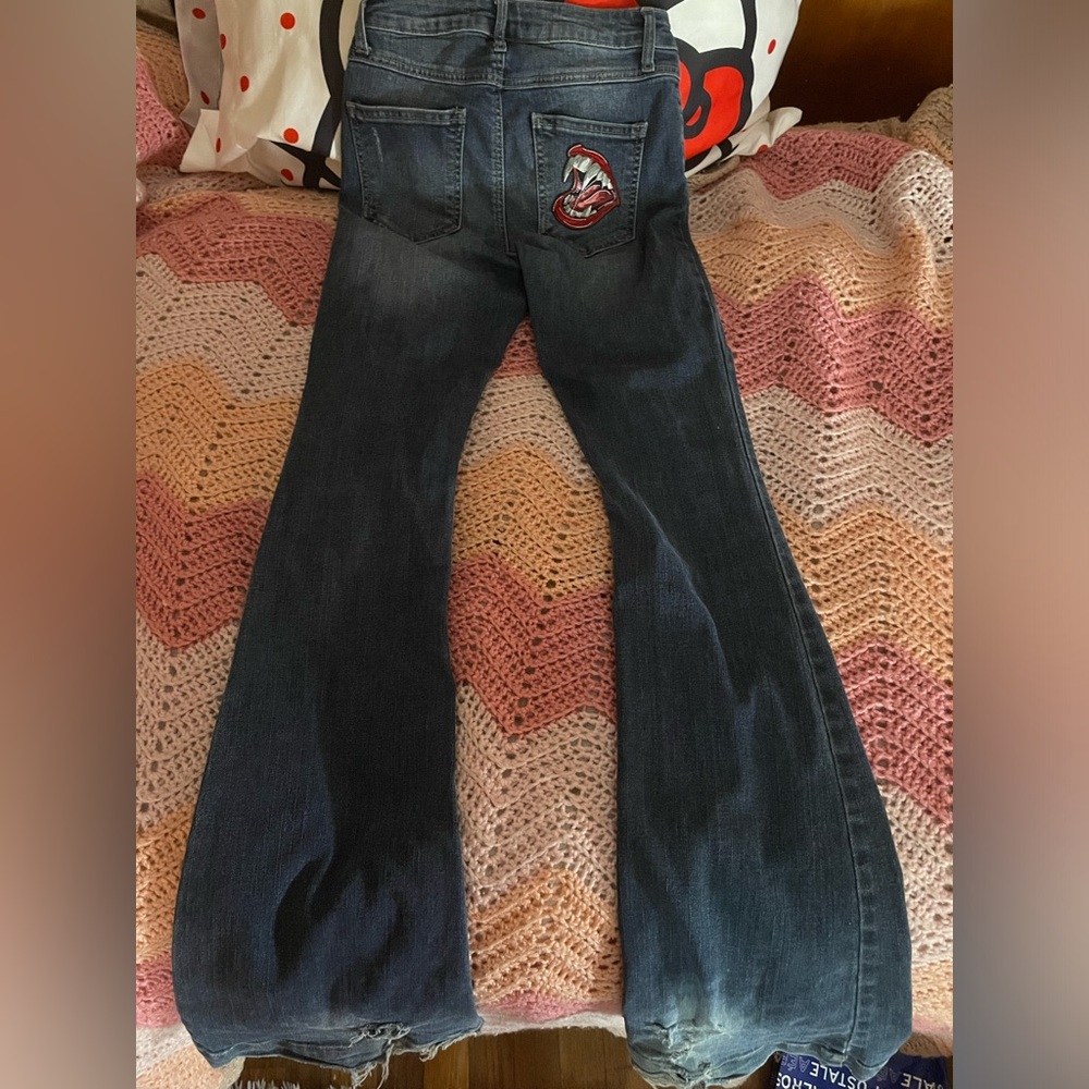 NAVY BLUE MID RISE PATCHES FLARED JEANS